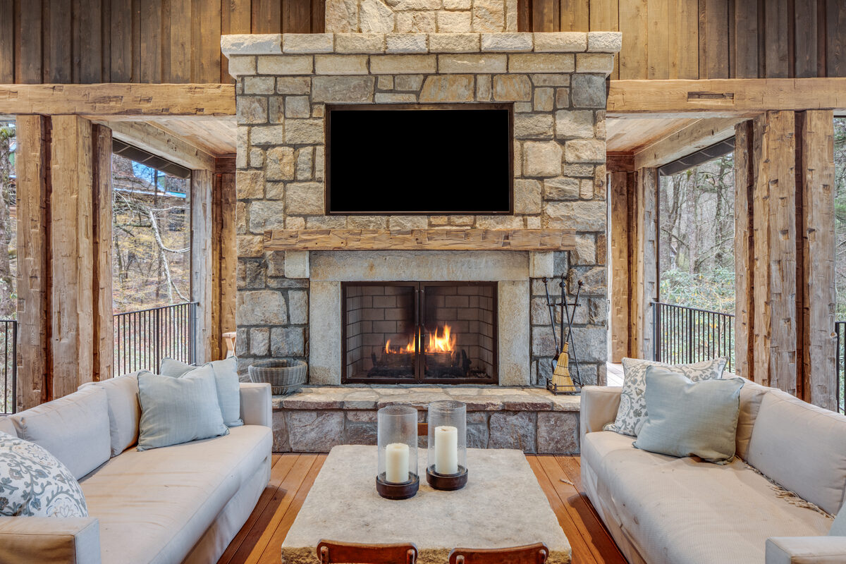Hand-forged outdoor fire screen for a mountain retreat in Cashiers, NC